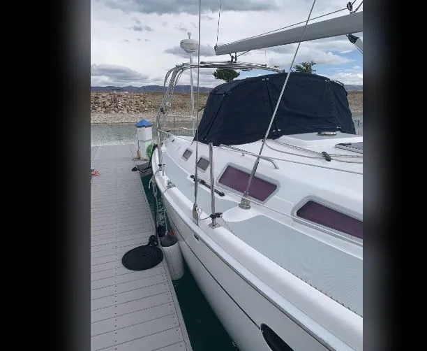 Slide: The Image of 2005 Hunter Mariner 36 sailboat docked at marina. - 3