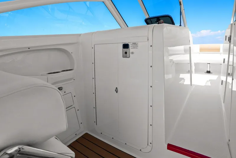 Slide: The Image of Interior of 2018 Edgewater 280CX Crossover with white finish. - 29