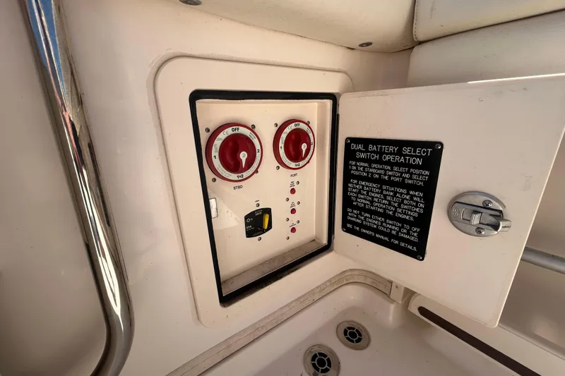 Slide: The Image of Control panel of a 2021 Grady-White Gulfstream 232 boat with dual battery switches. - 20
