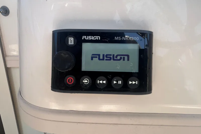 Slide: The Image of Fusion MS-NRX300 marine stereo on 2021 Grady-White Gulfstream 232 boat dashboard. - 37