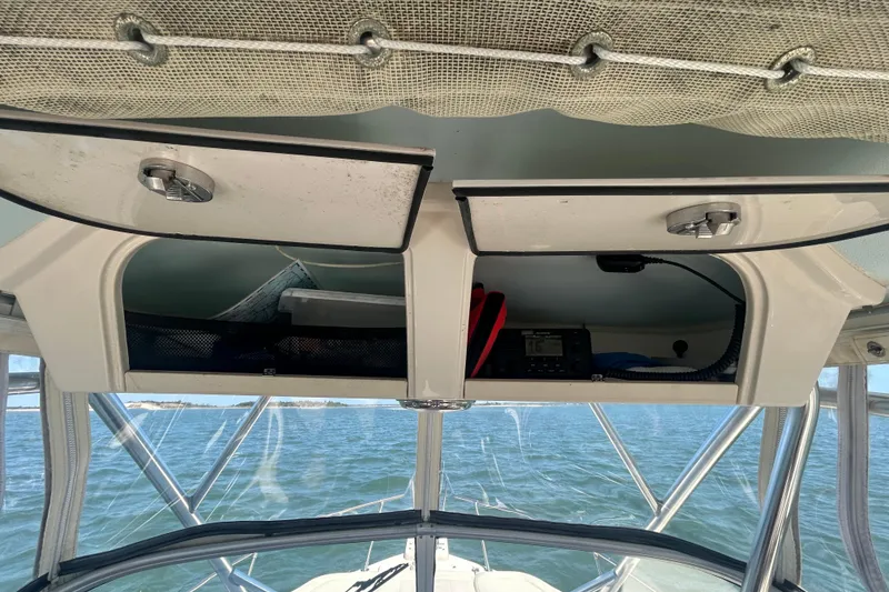 Slide: The Image of Grady-White Gulfstream 232 boat interior storage compartments, 2021 model, with ocean view. - 39