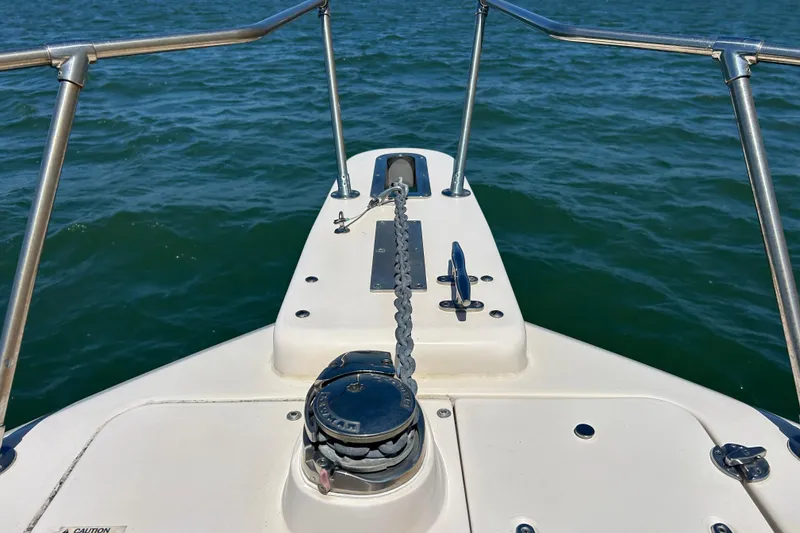 Slide: The Image of Bow of 2021 Grady-White Gulfstream 232 boat with anchor chain on water. - 48