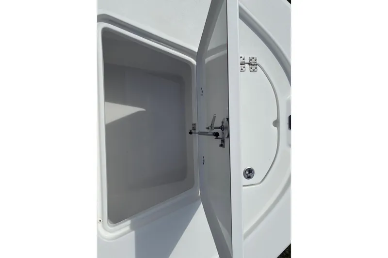 Slide: The Image of Open storage compartment on a 2026 Sea Pro 250 Bay boat. - 18