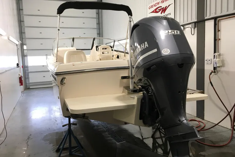 Slide: The Image of 2016 Grady-White Freedom 225 boat with Yamaha 250 engine in a garage. - 6