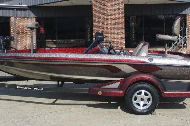 The Image of 2007 Ranger 188VS Intracoastal boat on trailer, parked outside a brick building. - 1