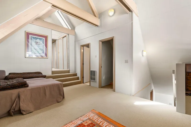 Slide: The Image of Spacious 1976 custom boathouse interior with vaulted ceilings and cozy seating area. - 21