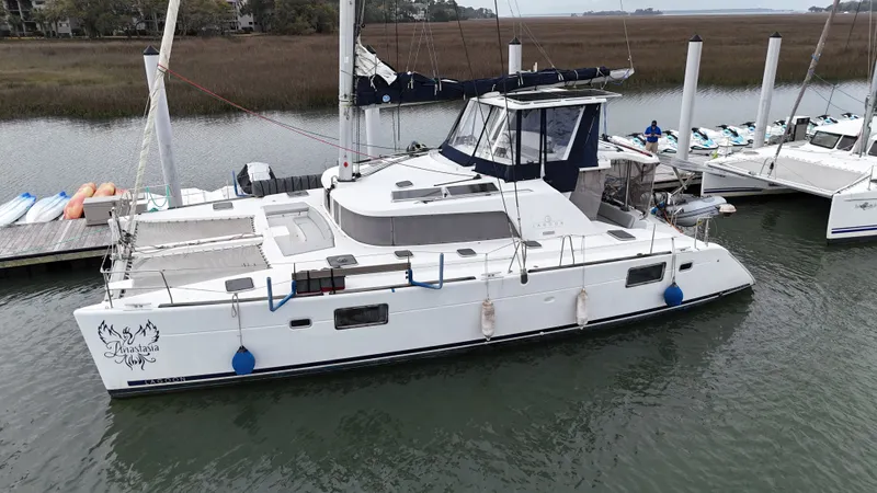 The Image of 2007 Lagoon 440 catamaran docked, side view. - 0