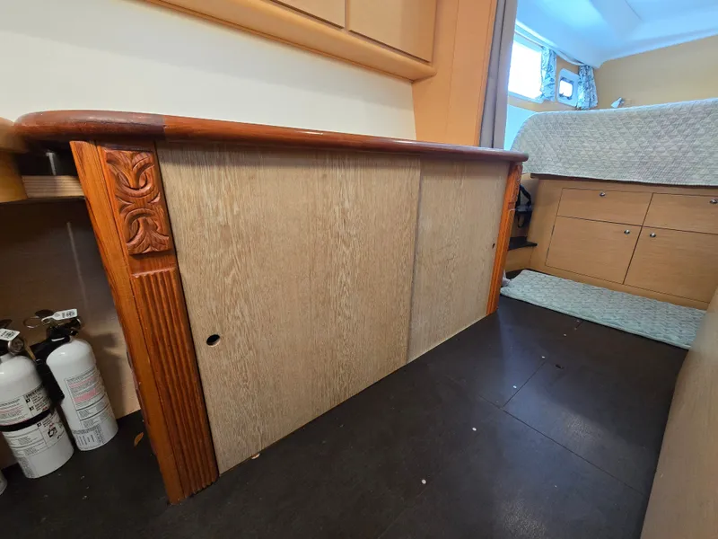 Slide: The Image of Interior of a 2007 Lagoon 440 yacht with wooden furnishings. - 15