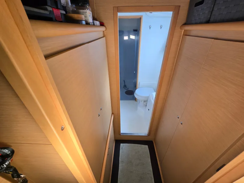 Slide: The Image of Interior of Lagoon 440 yacht, view into bathroom. - 18