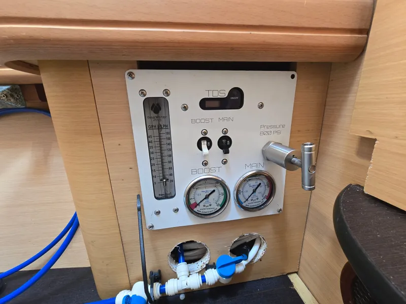 Slide: The Image of Control panel of a 2007 Lagoon 440 with pressure gauges. - 23