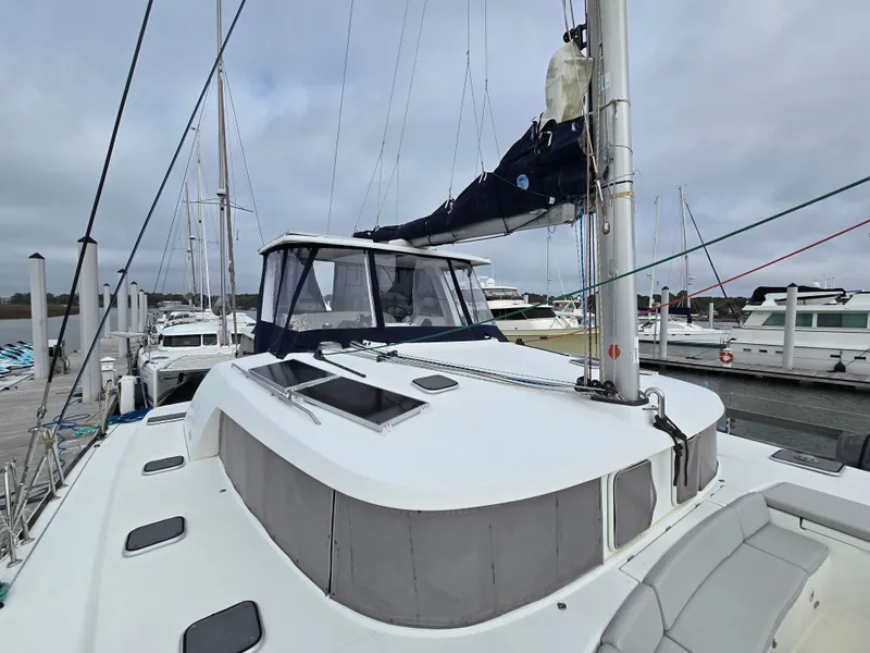 Slide: The Image of 2007 Lagoon 440 catamaran docked at marina. - 3