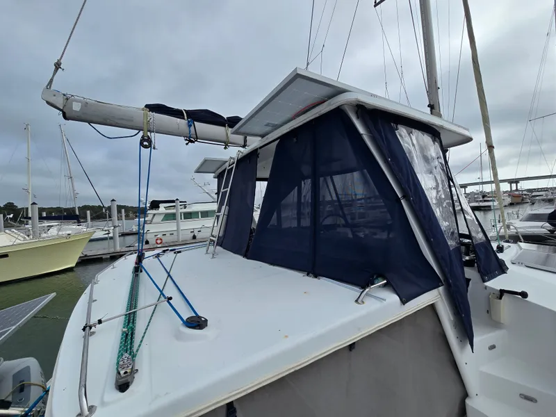 Slide: The Image of 2007 Lagoon 440 catamaran docked at marina. - 4