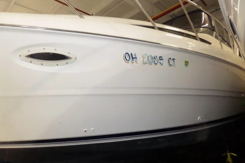 Slide: The Image of 2000 Bayliner 3055 Ciera boat with registration number OH 2085 CT. - 1