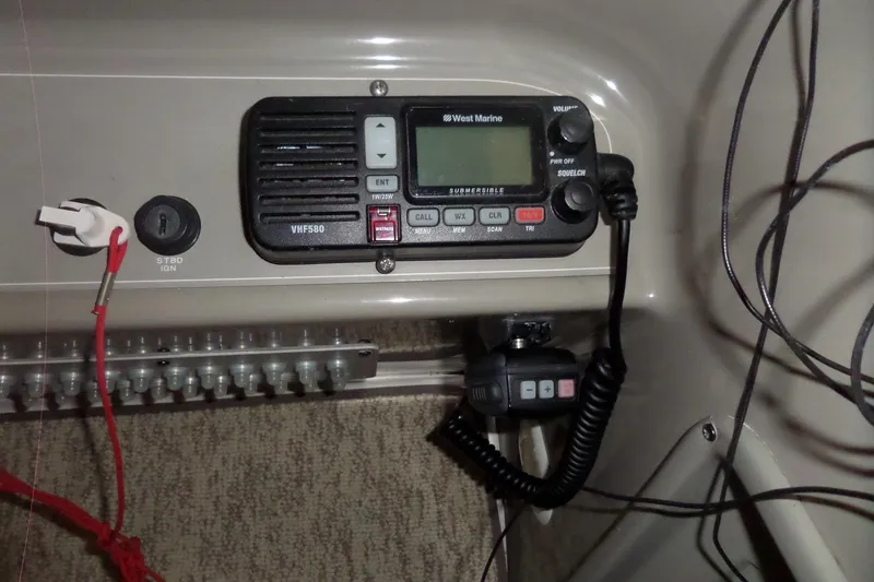 Slide: The Image of VHF radio system on 2000 Bayliner 3055 Ciera boat dashboard. - 13