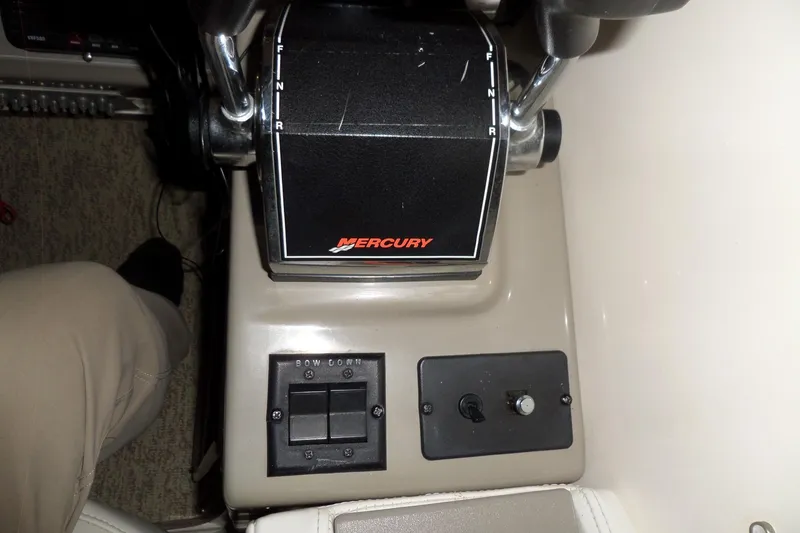 Slide: The Image of Control panel of a 2000 Bayliner 3055 Ciera boat with Mercury throttle. - 14
