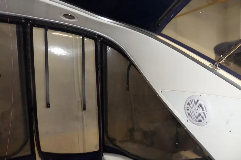 Slide: The Image of Interior view of a 2000 Bayliner 3055 Ciera boat with speaker and window. - 23