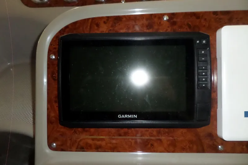 Slide: The Image of Garmin navigation system on 2000 Bayliner 3055 Ciera boat dashboard. - 8