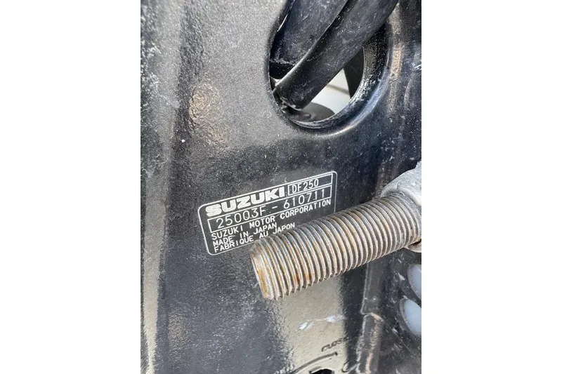 Slide: The Image of Close-up of Suzuki DF250 engine plate on 1999 Mako 221 Center Console boat. - 12