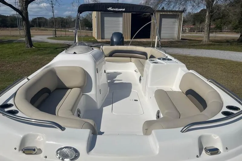 Slide: The Image of 2017 Hurricane SunDeck Sport 232 OB boat with spacious seating and canopy. - 7