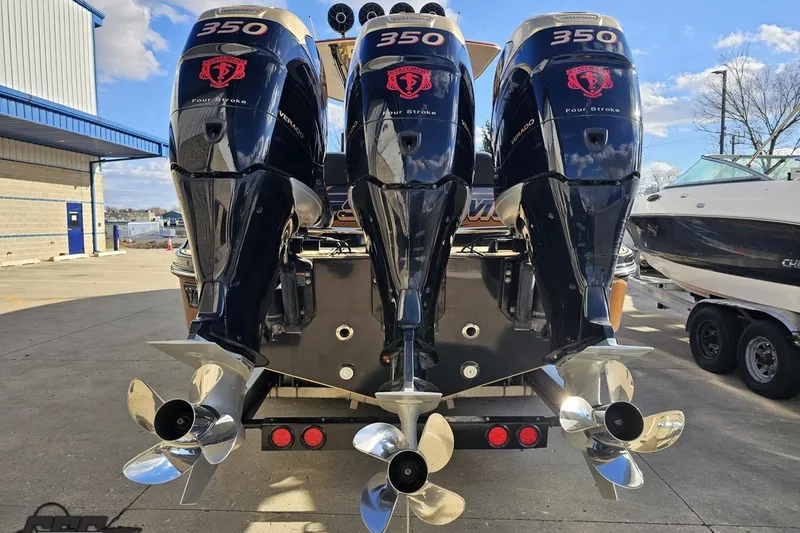 Slide: The Image of Triple 350 horsepower outboard engines on a 2017 Statement 380 Open boat. - 15