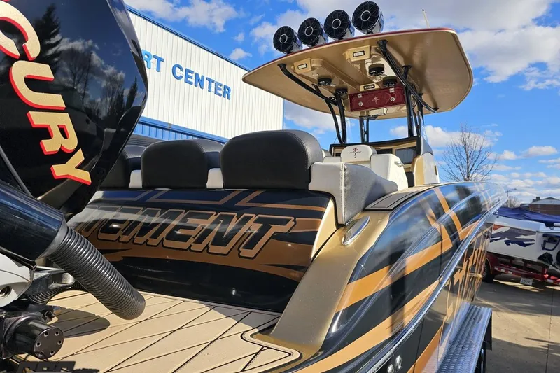 Slide: The Image of 2017 Statement 380 Open boat with Mercury engine at a sport center. - 17