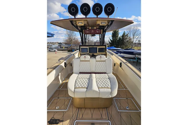 Slide: The Image of Luxury seating on 2017 Statement 380 Open boat with advanced controls and sleek design. - 20