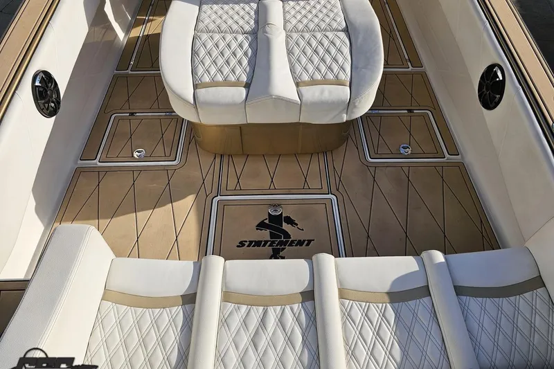 Slide: The Image of Luxurious interior of 2017 Statement 380 Open boat with quilted seating and wood-patterned flooring. - 21