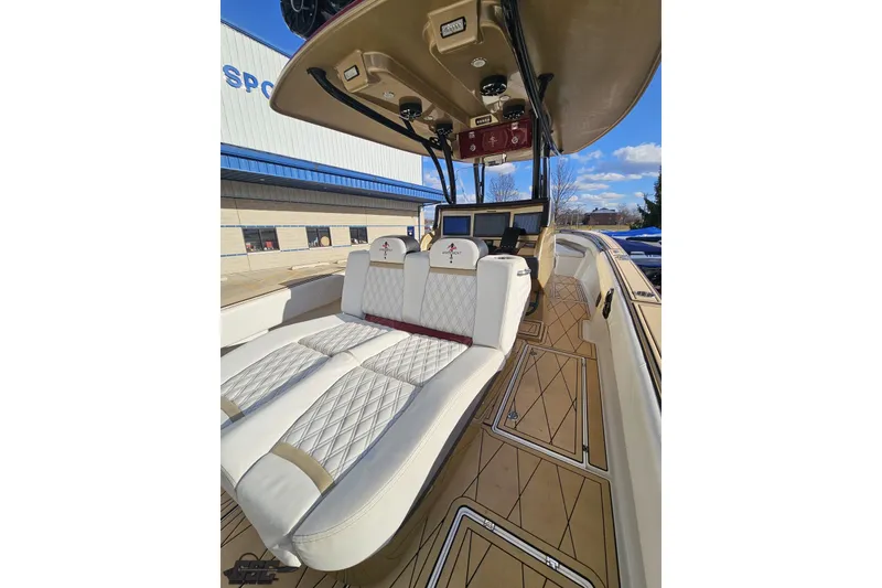 Slide: The Image of 2017 Statement 380 Open boat interior with luxurious seating and modern dashboard. - 28