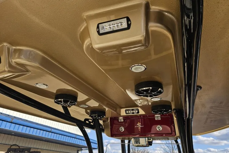 Slide: The Image of Interior view of a 2017 Statement 380 Open boat, featuring speakers and lighting. - 30