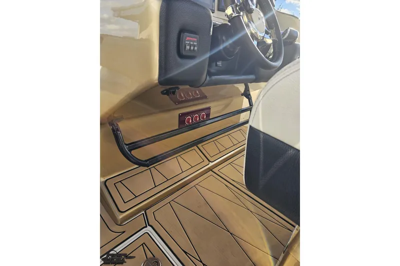 Slide: The Image of Interior view of a 2017 Statement 380 Open boat, featuring sleek design and controls. - 35