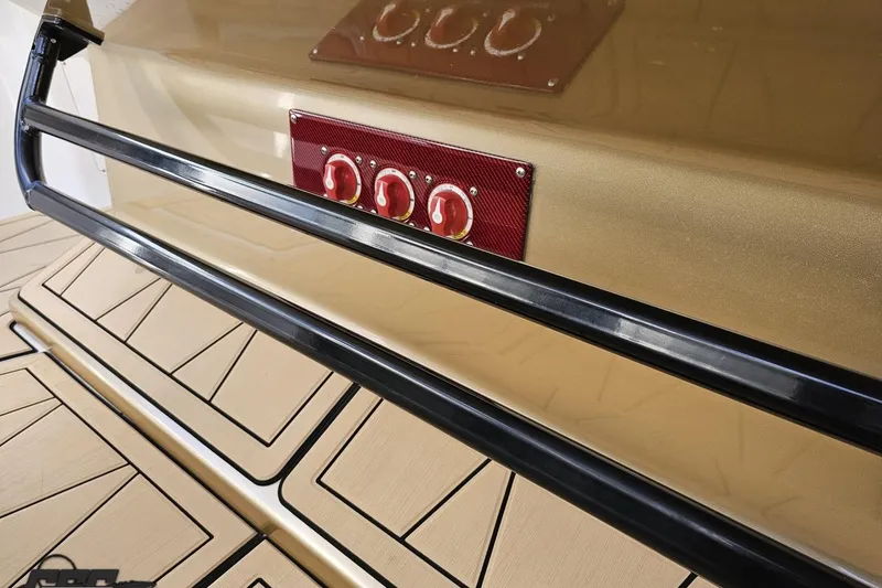 Slide: The Image of 2017 Statement 380 Open boat with sleek design and red control panel. - 37