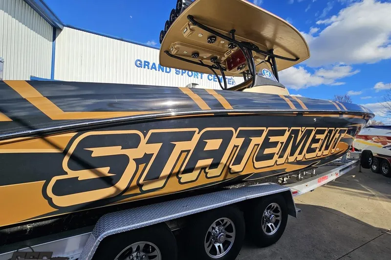 Slide: The Image of 2017 Statement 380 Open boat on trailer at Grand Sport Center. - 4