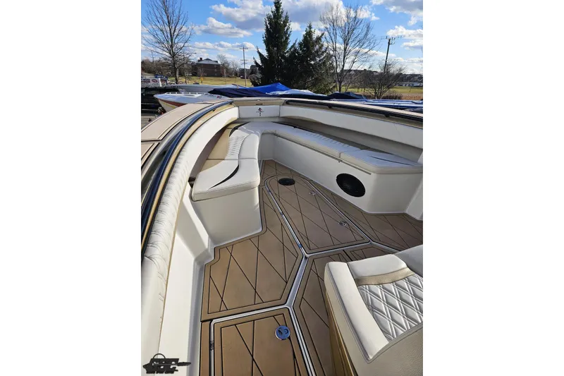 Slide: The Image of Luxurious interior of 2017 Statement 380 Open boat with cushioned seating and wood-patterned flooring. - 49