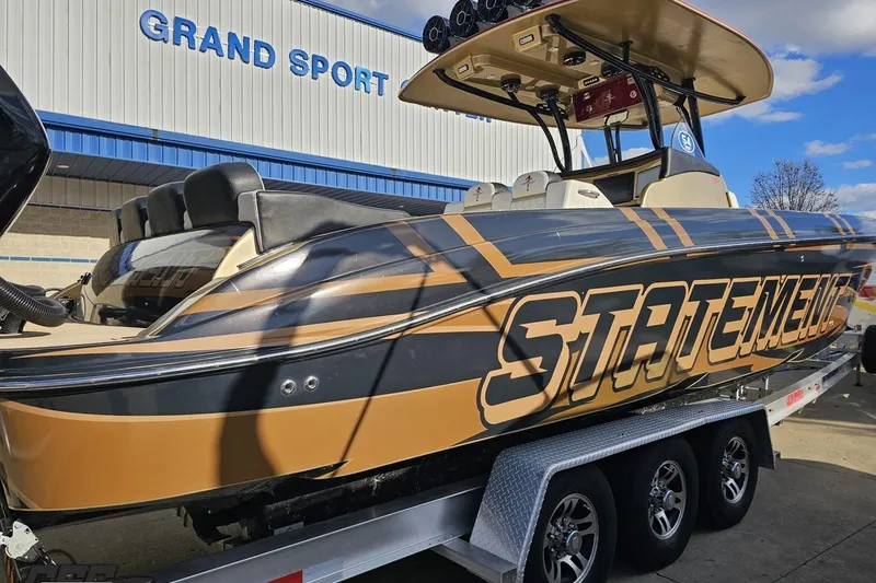 Slide: The Image of 2017 Statement 380 Open boat on trailer at Grand Sport facility. - 5