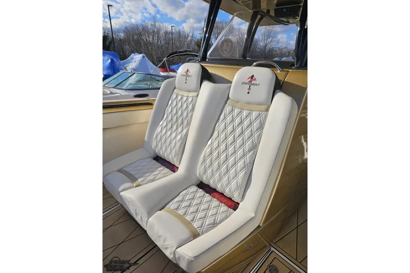 Slide: The Image of Luxurious seating on 2017 Statement 380 Open boat with quilted white upholstery. - 60