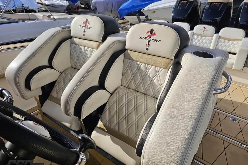 Slide: The Image of Luxurious seating on a 2017 Statement 380 Open boat with diamond-stitched upholstery. - 65