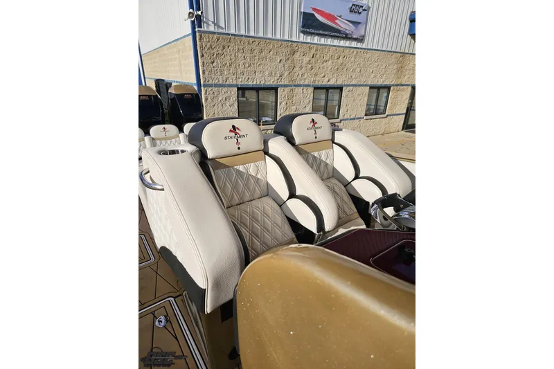 Slide: The Image of Luxurious seating on a 2017 Statement 380 Open boat, featuring elegant diamond stitching. - 67