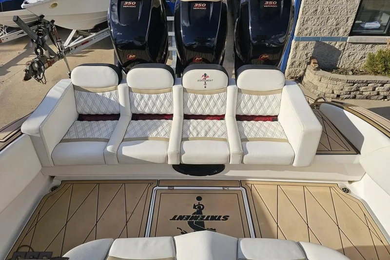 Slide: The Image of 2017 Statement 380 Open boat interior with luxurious seating and powerful engines. - 70