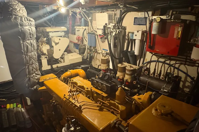 Slide: The Image of Engine room of a 1971 Philbrooks Trawler, showcasing machinery and equipment. - 11