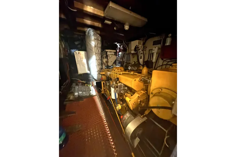 Slide: The Image of Engine room of a 1971 Philbrooks Trawler, showcasing machinery and equipment. - 14