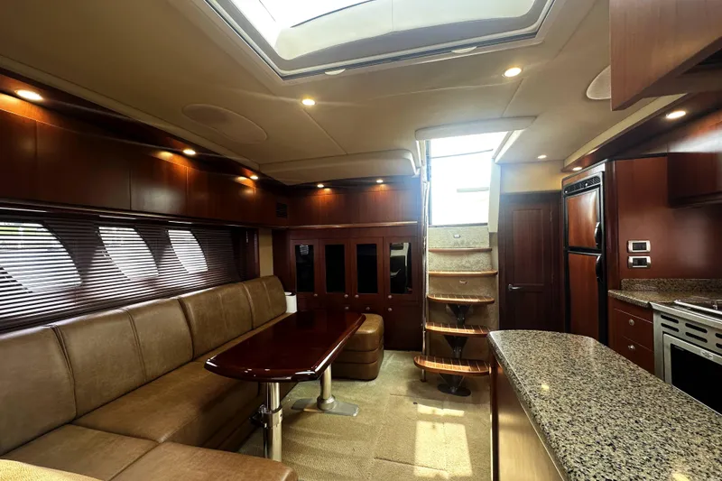 Slide: The Image of Luxurious interior of 2006 Sea Ray 48 Sundancer yacht with elegant wood finishes. - 15