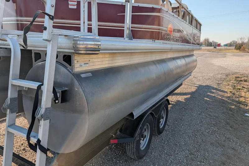 Slide: The Image of 2014 Sun Tracker Party Barge 22 XP3 pontoon boat on trailer, side view. - 33