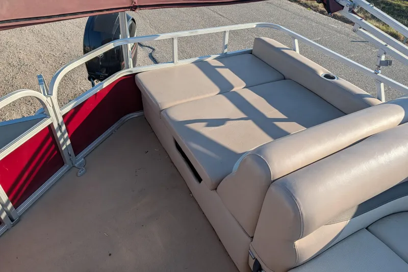 Slide: The Image of 2014 Sun Tracker Party Barge 22 XP3 with beige seating and red accents. - 42