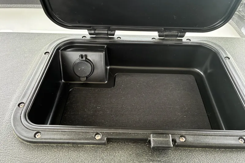 Slide: The Image of Open storage compartment on 2026 Sea Pro 245FLX Sandbar boat. - 17