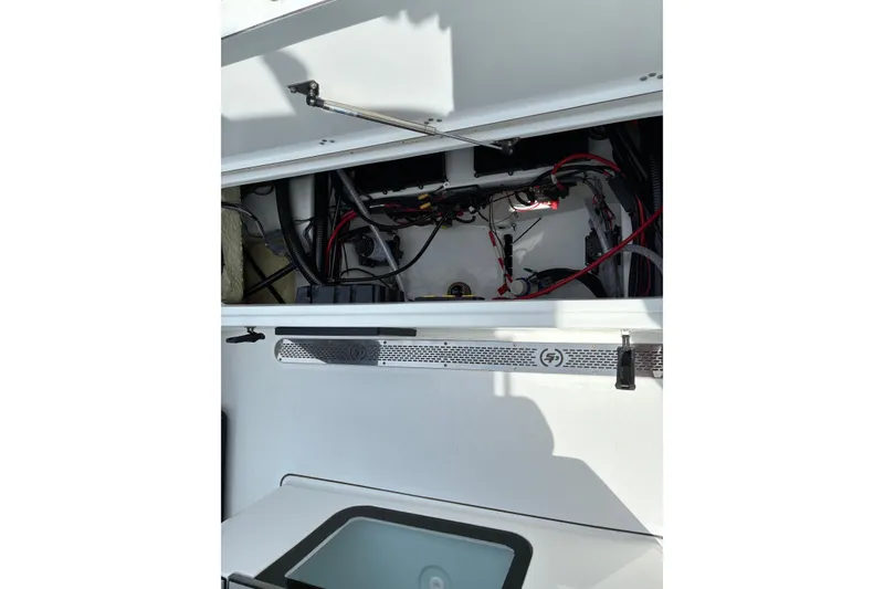 Slide: The Image of Interior view of 2026 Sea Pro 245FLX Sandbar boat's wiring and components. - 22