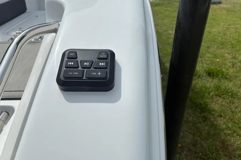 Slide: The Image of Control panel on 2026 Sea Pro 245FLX Sandbar boat, featuring audio controls. - 4