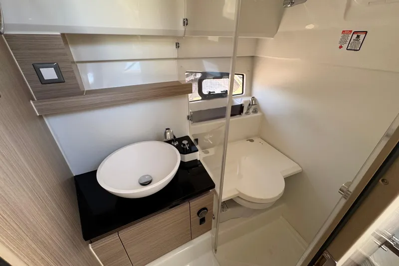 Slide: The Image of Modern bathroom in 2026 Jeanneau Leader 9.0 WA Series 2 boat, featuring sleek design. - 11
