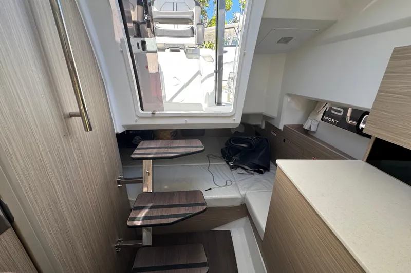 Slide: The Image of Interior of 2026 Jeanneau Leader 9.0 WA Series 2, featuring modern cabin design. - 15