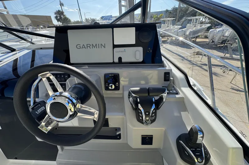 Slide: The Image of Helm of 2026 Jeanneau Leader 9.0 WA Series 2 with Garmin navigation system. - 18