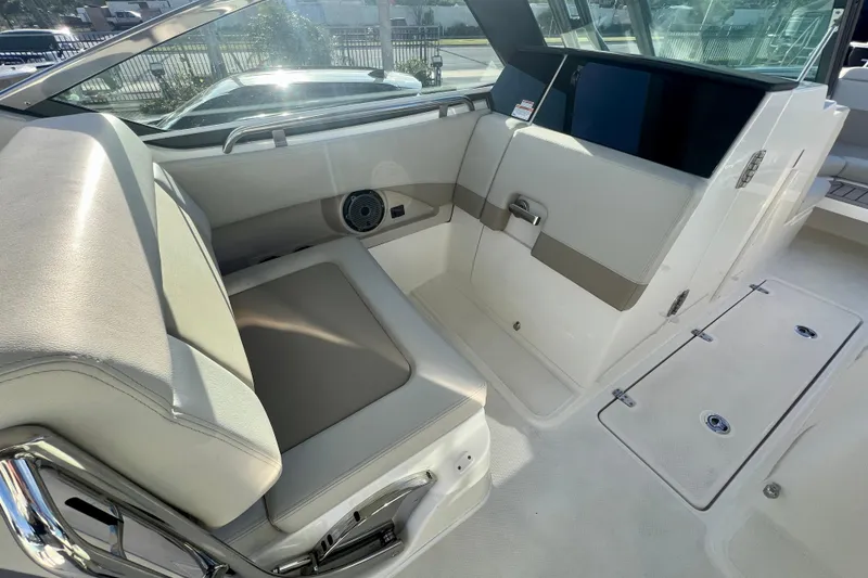 Slide: The Image of 2025 Boston Whaler 240 Vantage interior seating area. - 14